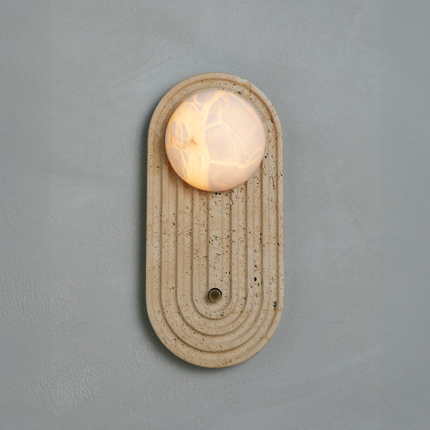 Sierra wall sconce in travertine with alabaster diffuser, Studio Baldo