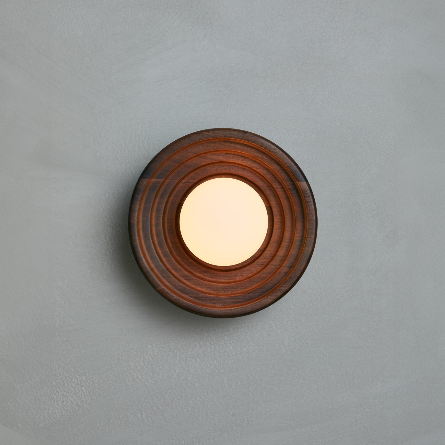 Bruma Wall Sconce in walnut and aged brass, Studio Baldo