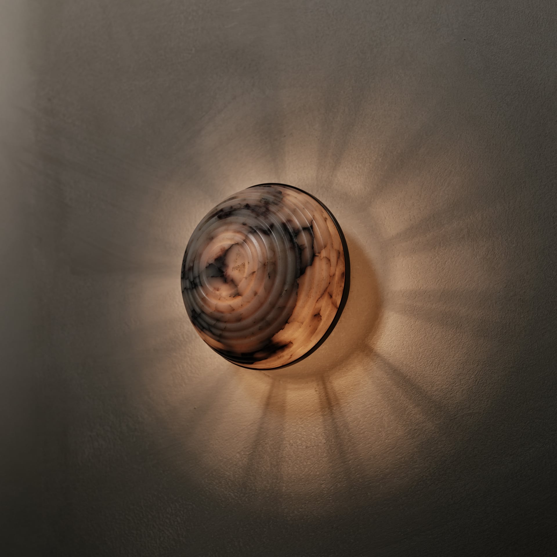 Contour Wall Sconce in Calacatta Viola and brown wax polished, angled view, Studio Baldo