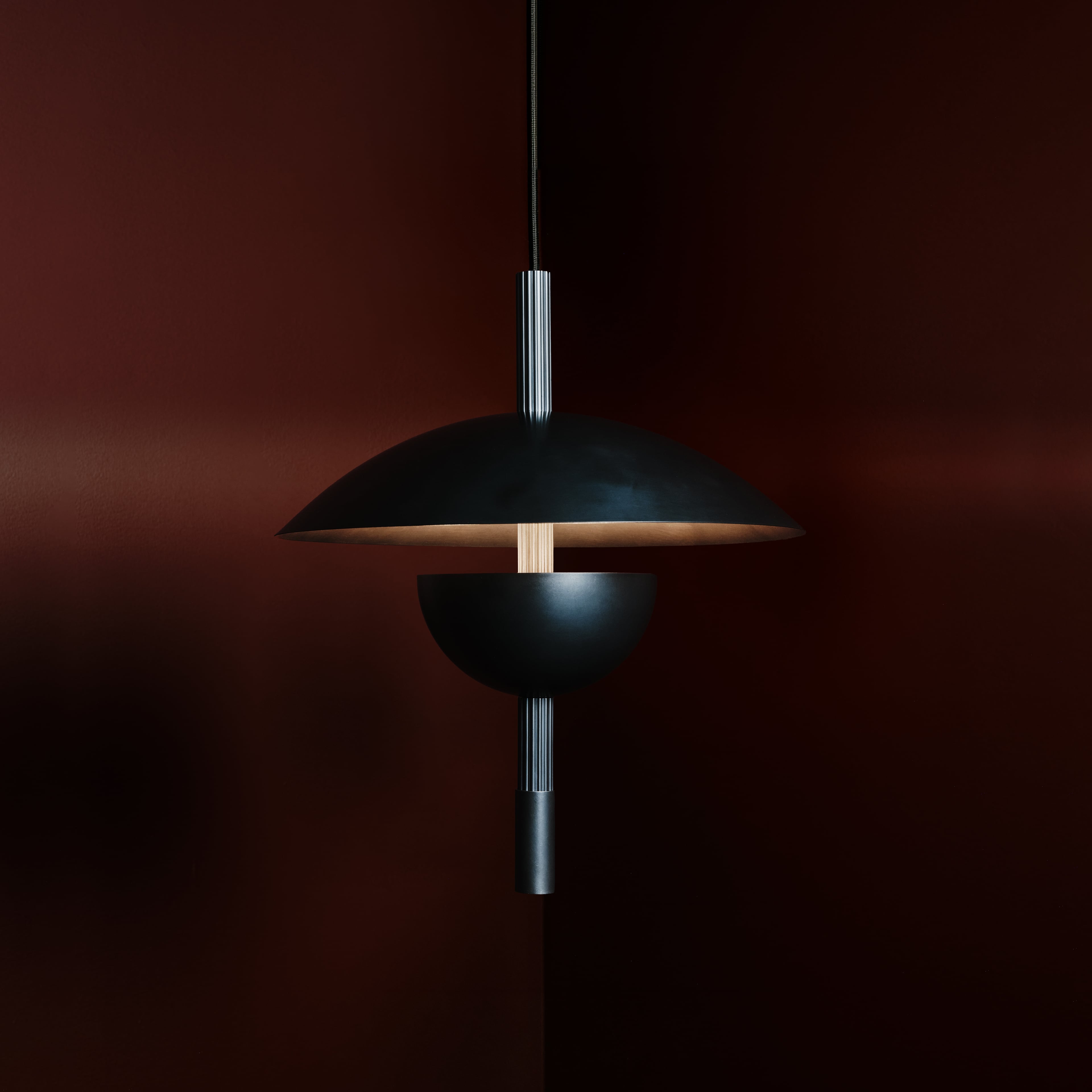 Orbit Ceiling Pendant in aged brass, lit, Studio Baldo