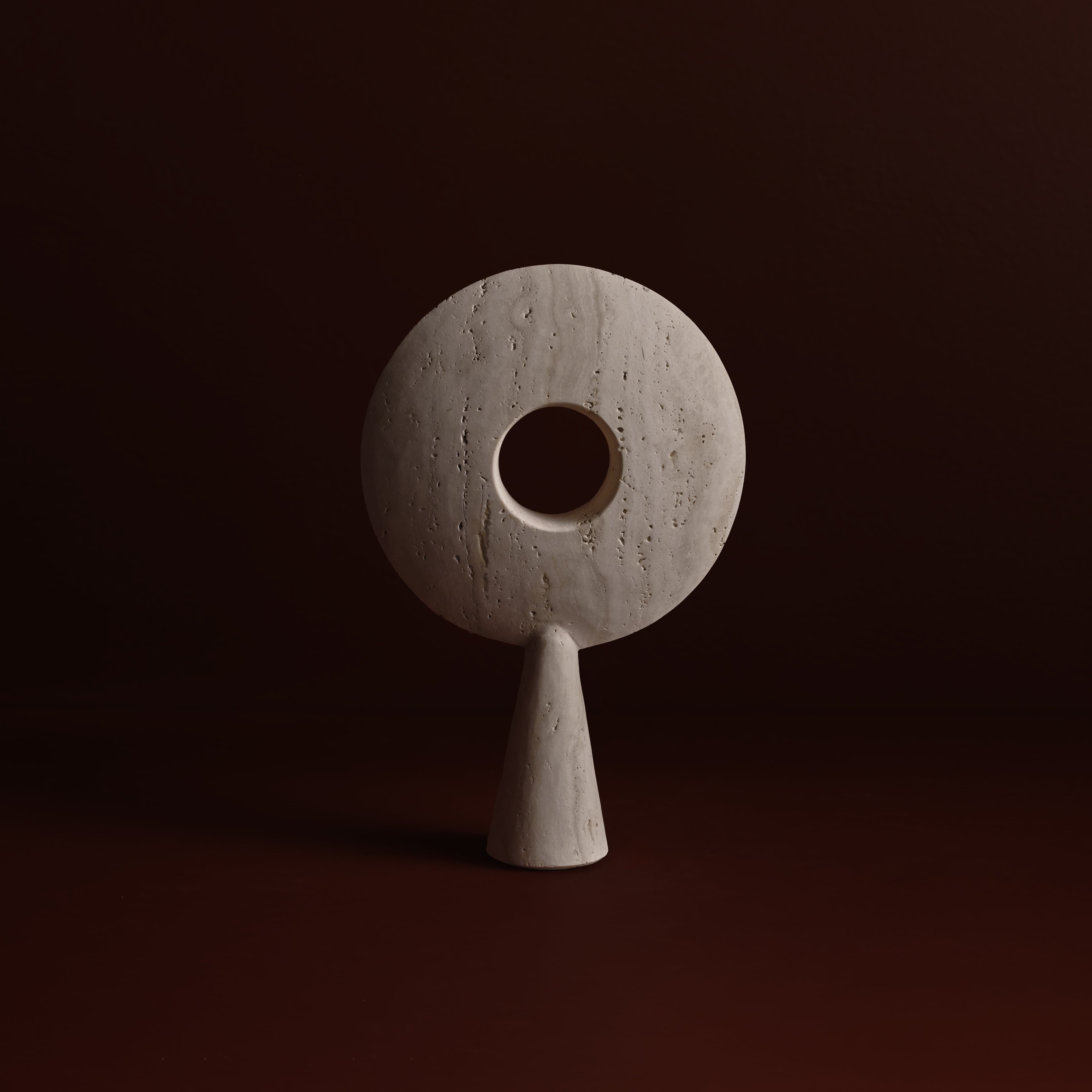 Pygg Sculpture in Travertine, angled view, Studio Baldo