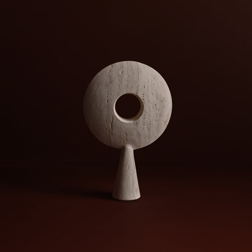Pygg Sculpture in Travertine, angled view, Studio Baldo