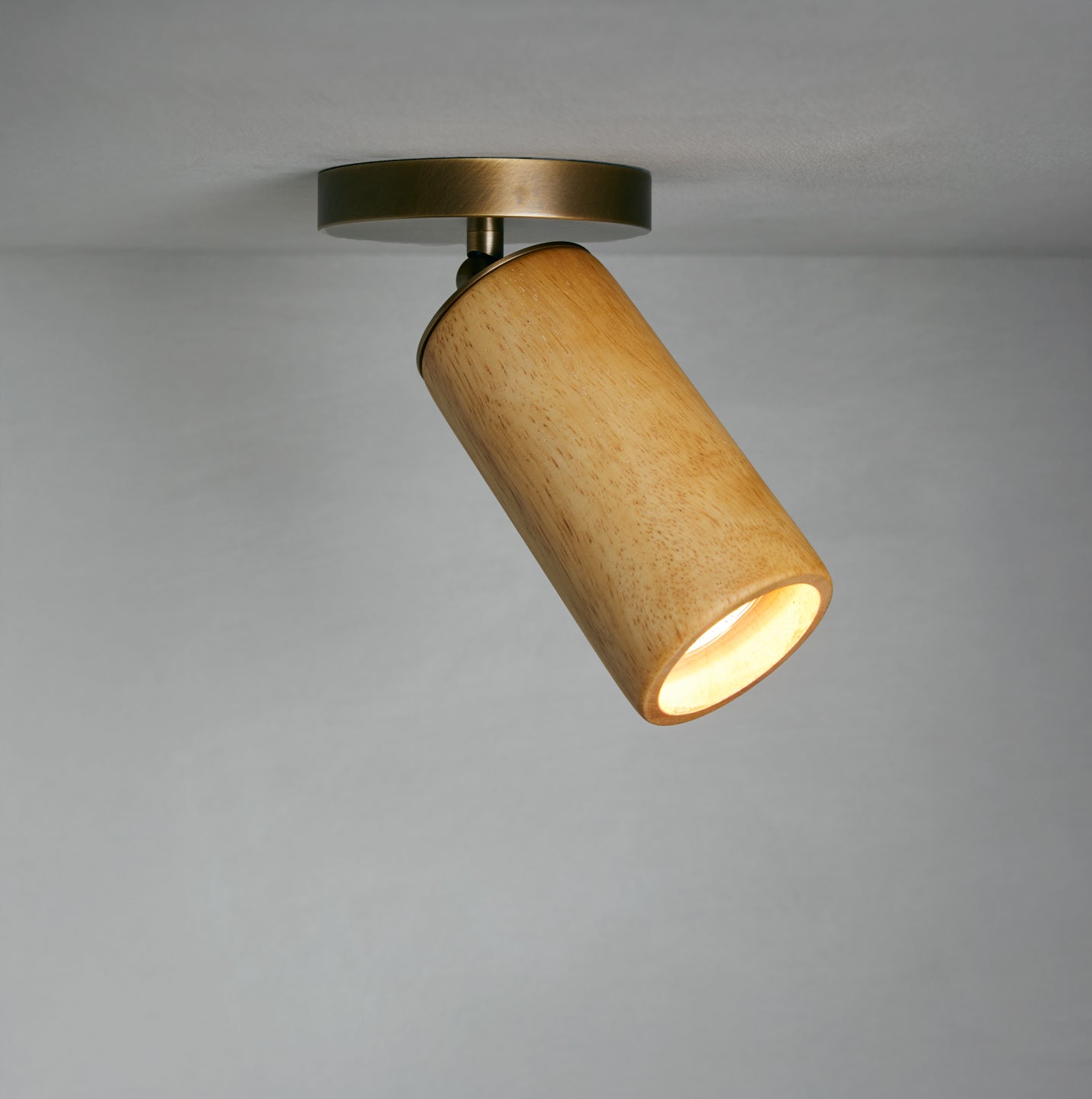 Rayo Ceiling Mount in oak, angled view, Studio Baldo